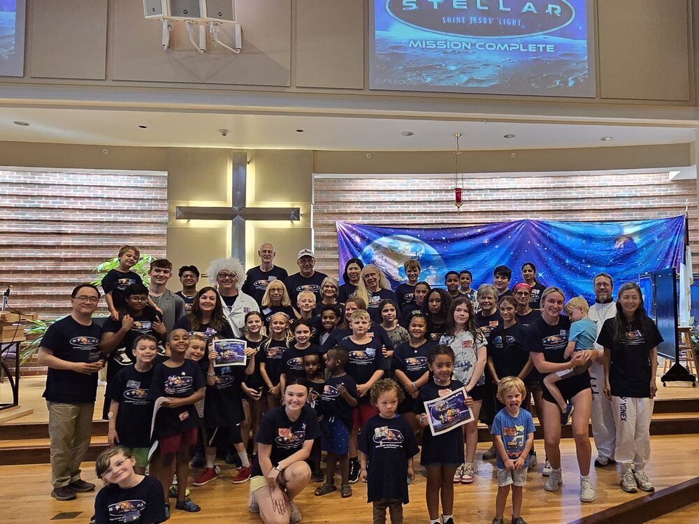 Group photo of children and volunteers at Aldersgate's 2024 Vacation Bible School